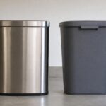Close-up of stainless steel and plastic trash can materials