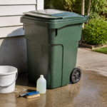 Outdoor trash cart with hose, brush and cleaning supplies